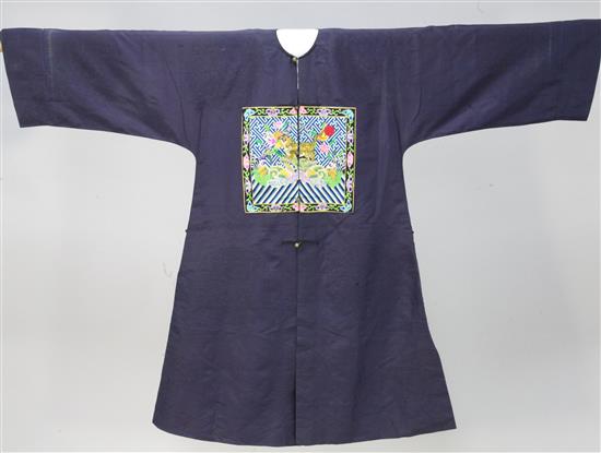 A Chinese midnight blue silk brocade robe for a military official of the 4th rank,